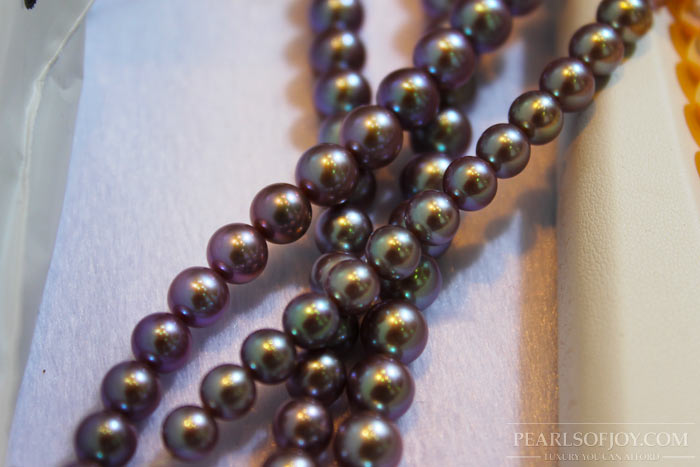close up of black, metallic pearls