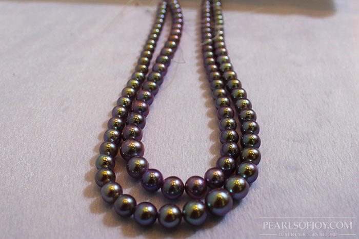 strands of black, freshwater pearls