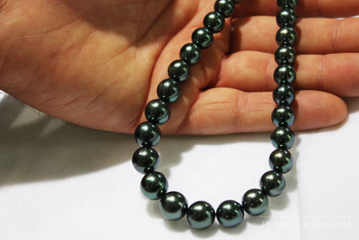 close up of a matched Tahitian pearl strand
