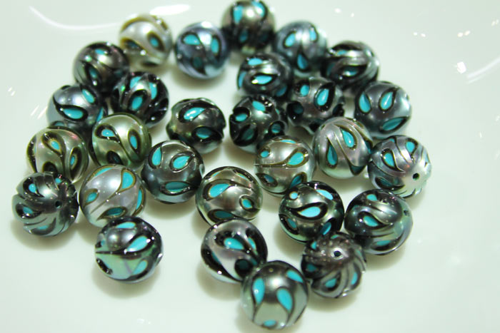 a close up of the Turquoise Galatea pearls
