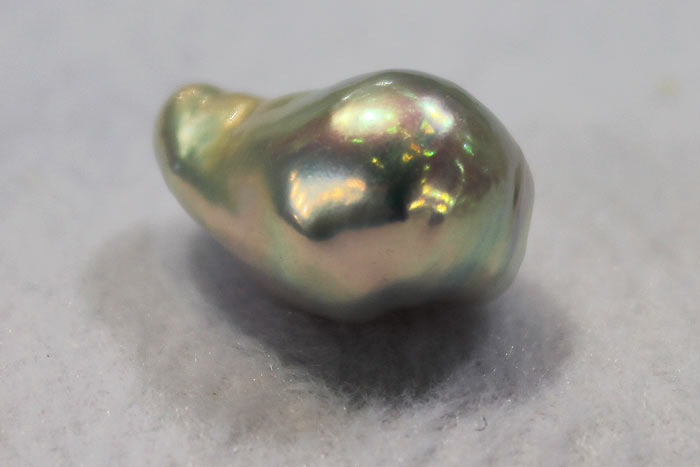 a close up of a bead nucleated pearl