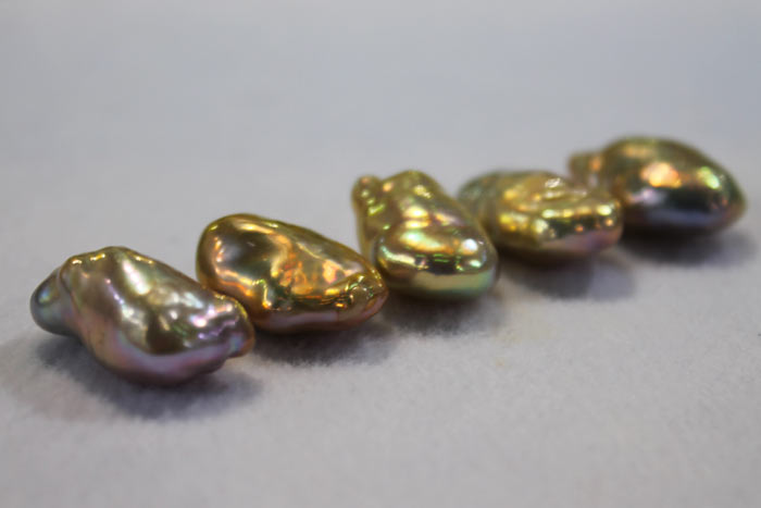a row of metallic souffle pearls