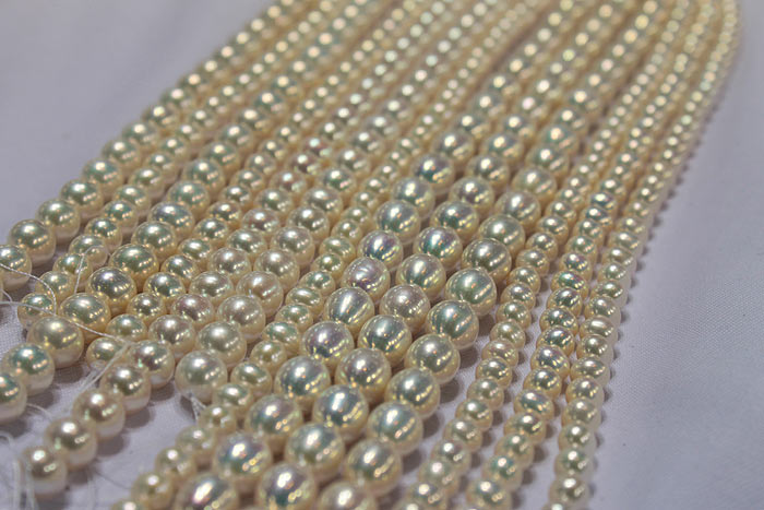 more pearl strands in a light gold color