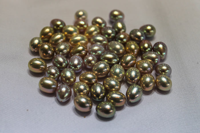 beautiful dark gold drop pearls