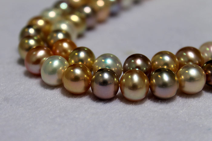 a closer look at the round pearls' exquisite metallic luster