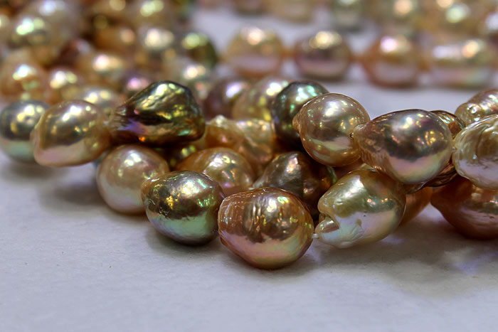 freshwater ripple pearls with a metallic sheen