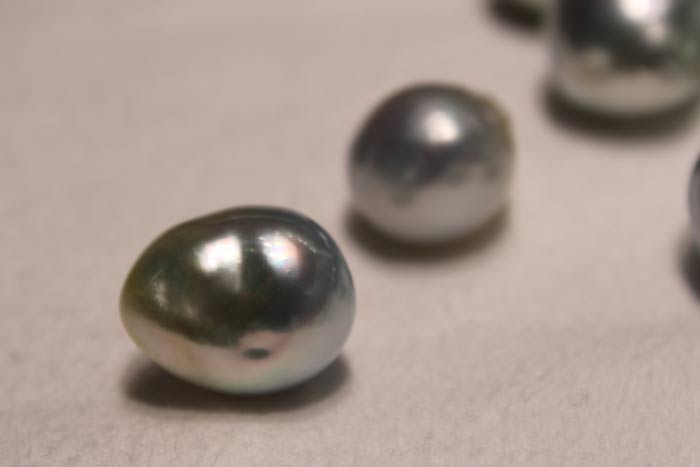 baroque south sea pearl with multi-colored overtone