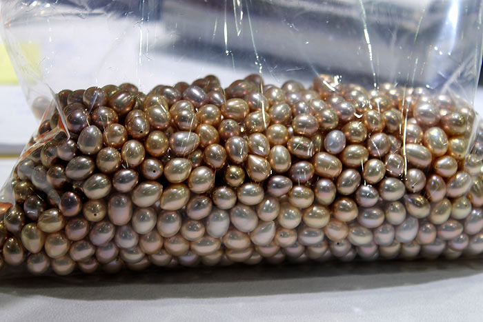 a bag of rare colored drop pearls
