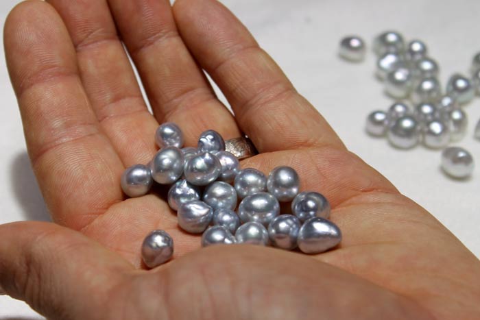 handful of tiny baroque south sea pearls