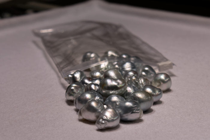 bag of big beautiful silver/blue south sea pearls