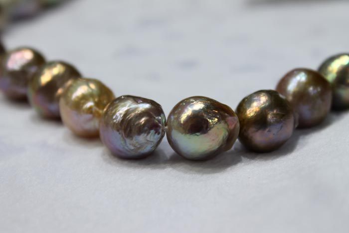 big ripple pearls with rainbow orient