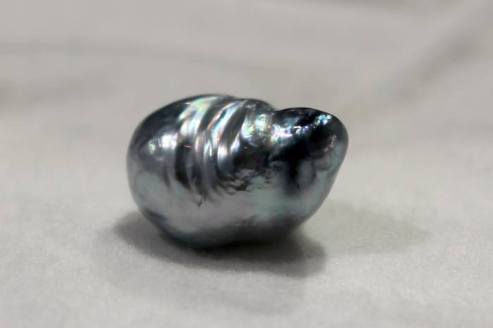 a single blue baroque pearl