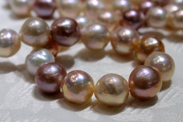 closer look at a multi-colored strand of ripple pearls