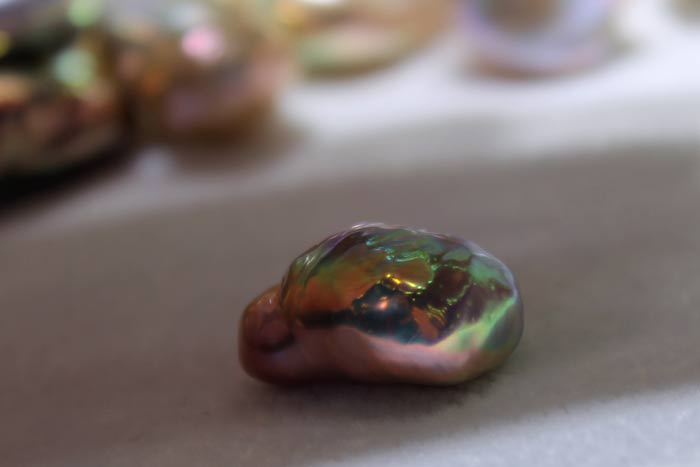 close up of a colorful metallic souffle pearl