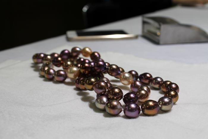 a strand of big, colorful drop pearls