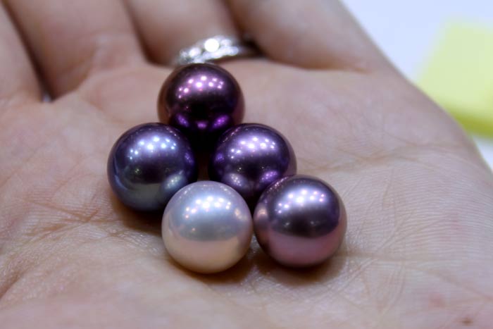 white, deep purples, and a blueberry pearl