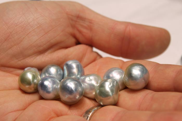 a handful of silver south sea pearls