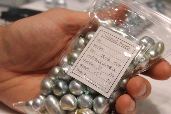 a bag of two-toned south sea pearls