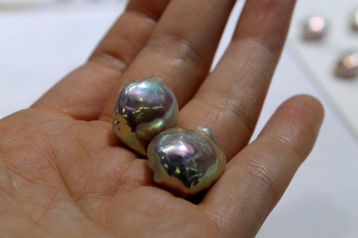 a pair of rare colored Souffle pearls