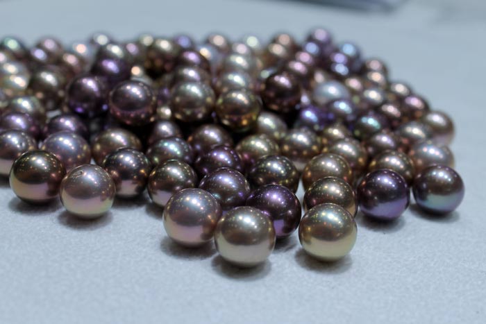 close up of different colored Edison pearls