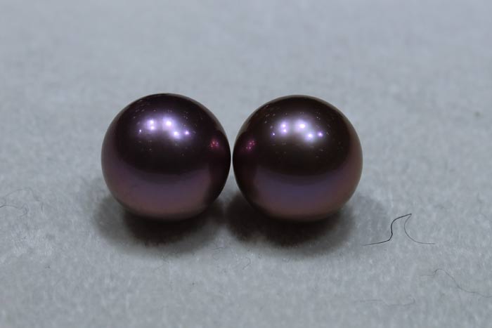 matched pair of deep purple Edison pearls