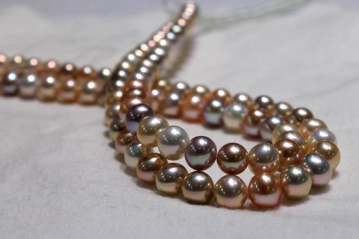 double strands of metallic pearls