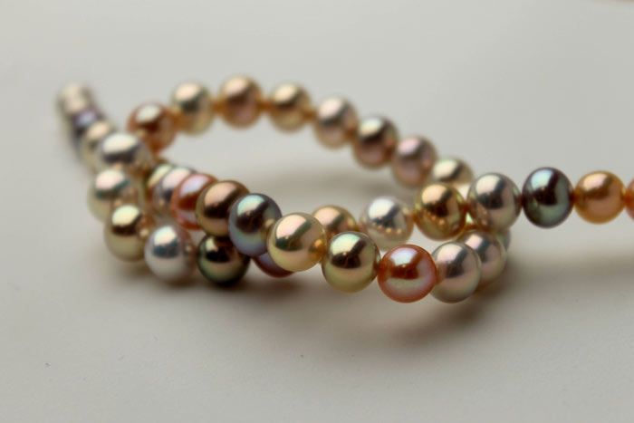 metallic, multi-colored round pearls