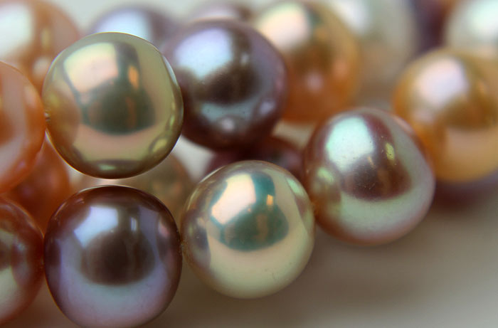 close up of metallic round pearls
