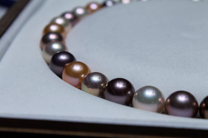 close up of the multicolored metallic pearls