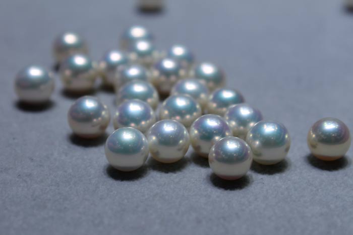 white metallic pearls with colorful overtones