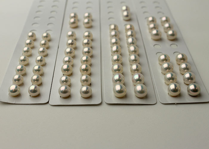 white metallic pearl studs