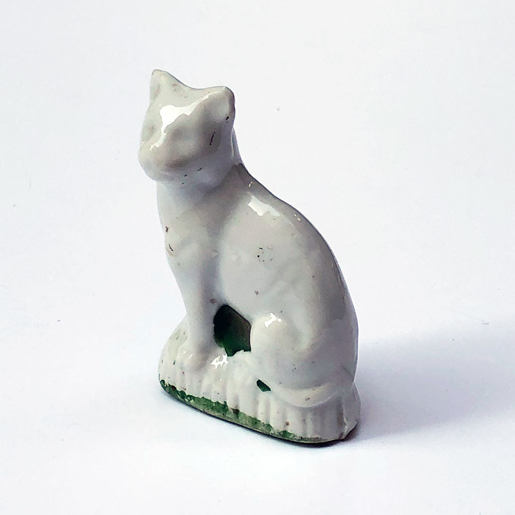 white cat figurine