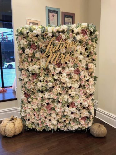 Nicol Floral Design made a custom floral backdrop