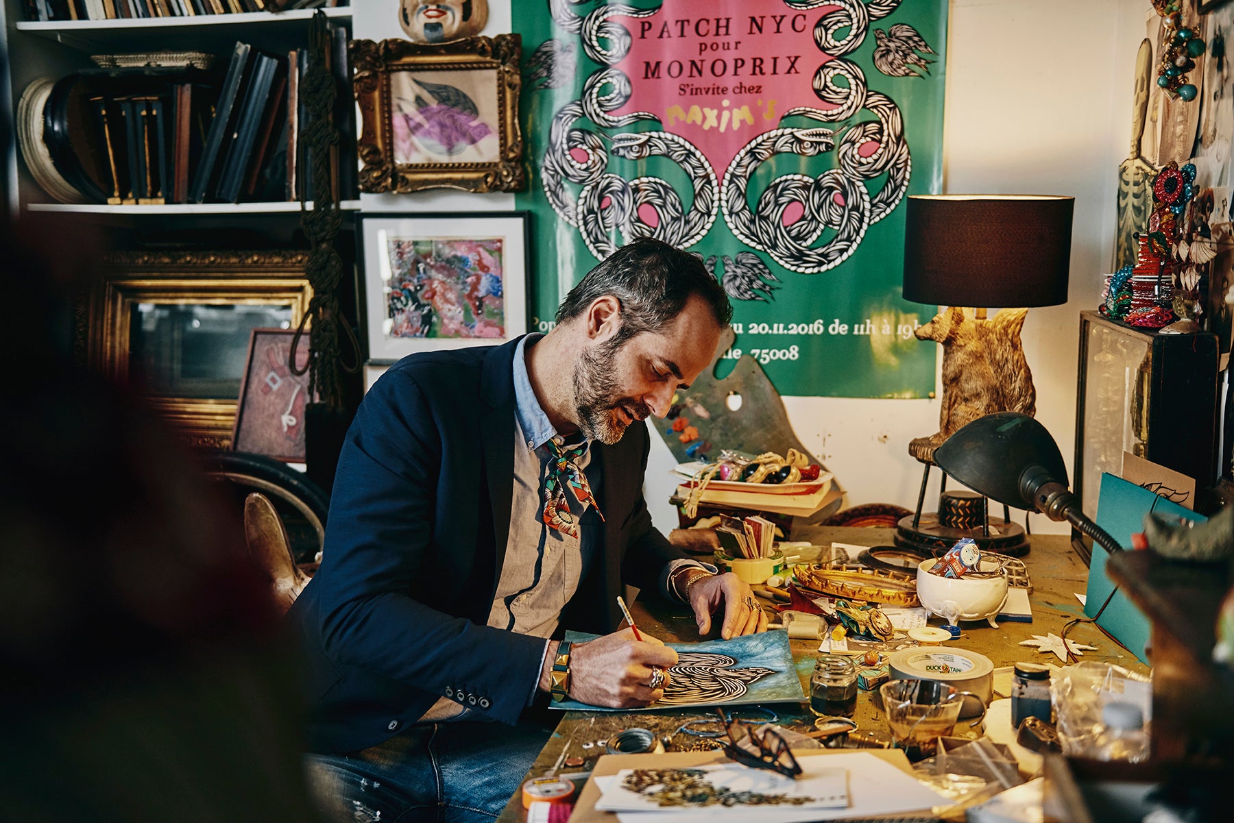 Designer and co-founder of Patch NYC in his studio creating custom artwork for their signature houseware pieces.