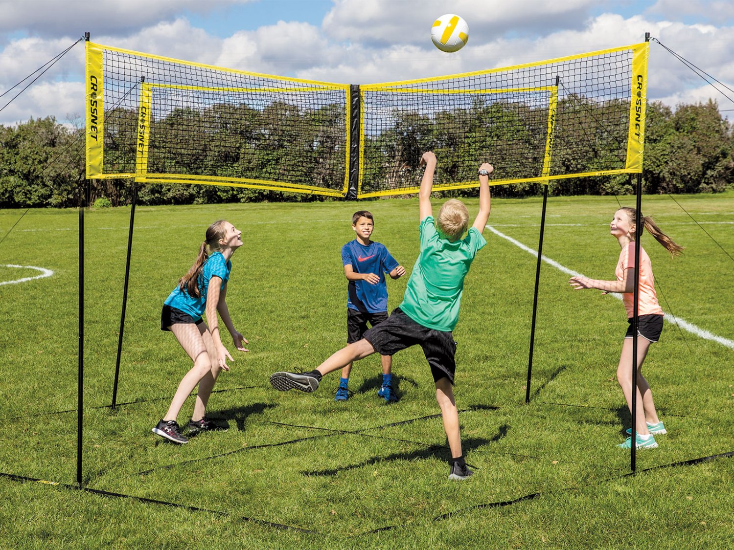 A group of children play CROSSNET. 