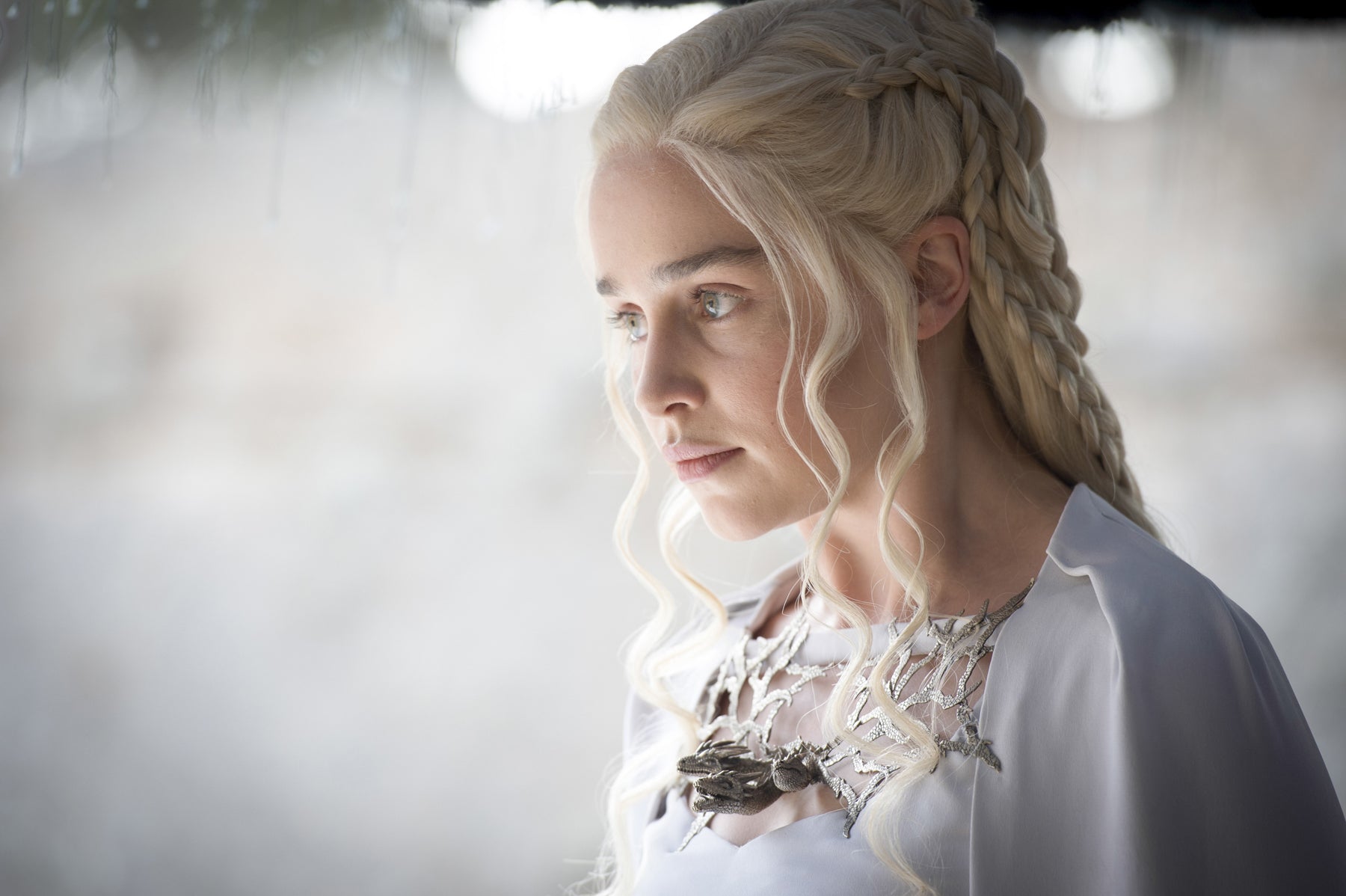 Daenerys, appearing angry, looks off-camera. 