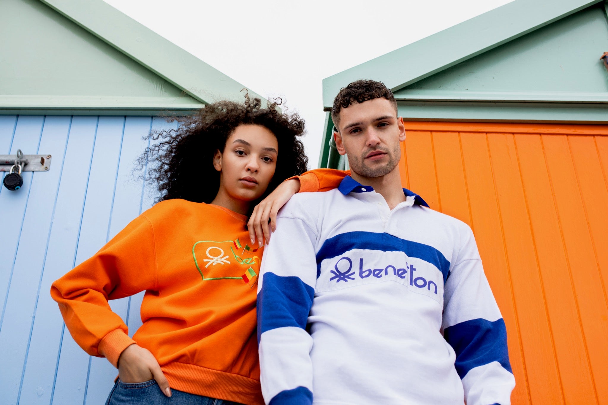 A male and female model wearing some vintage sweatshirts from True Vintage. 