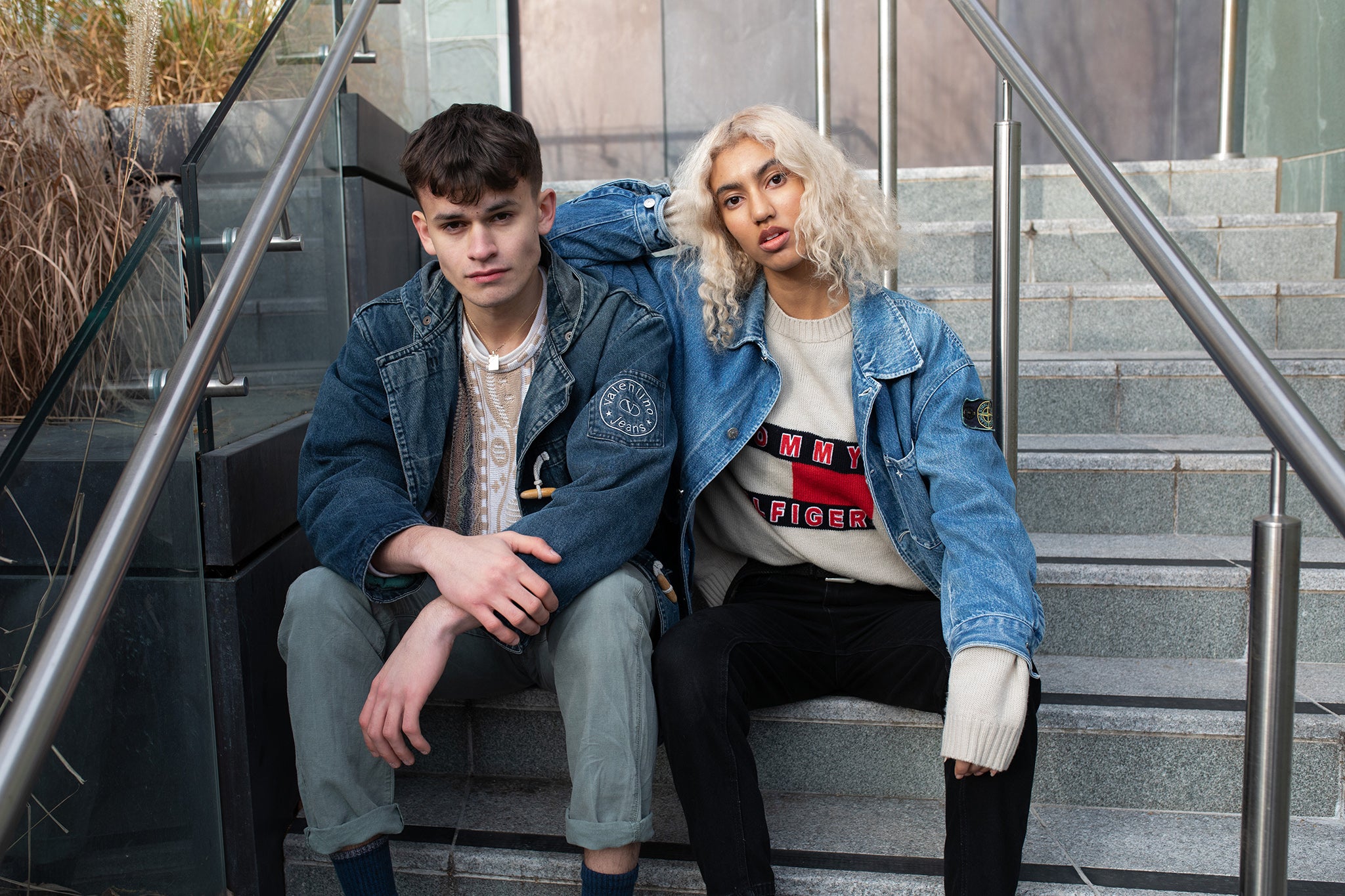 A male and female model wearing some of True Vintage's clothing. 