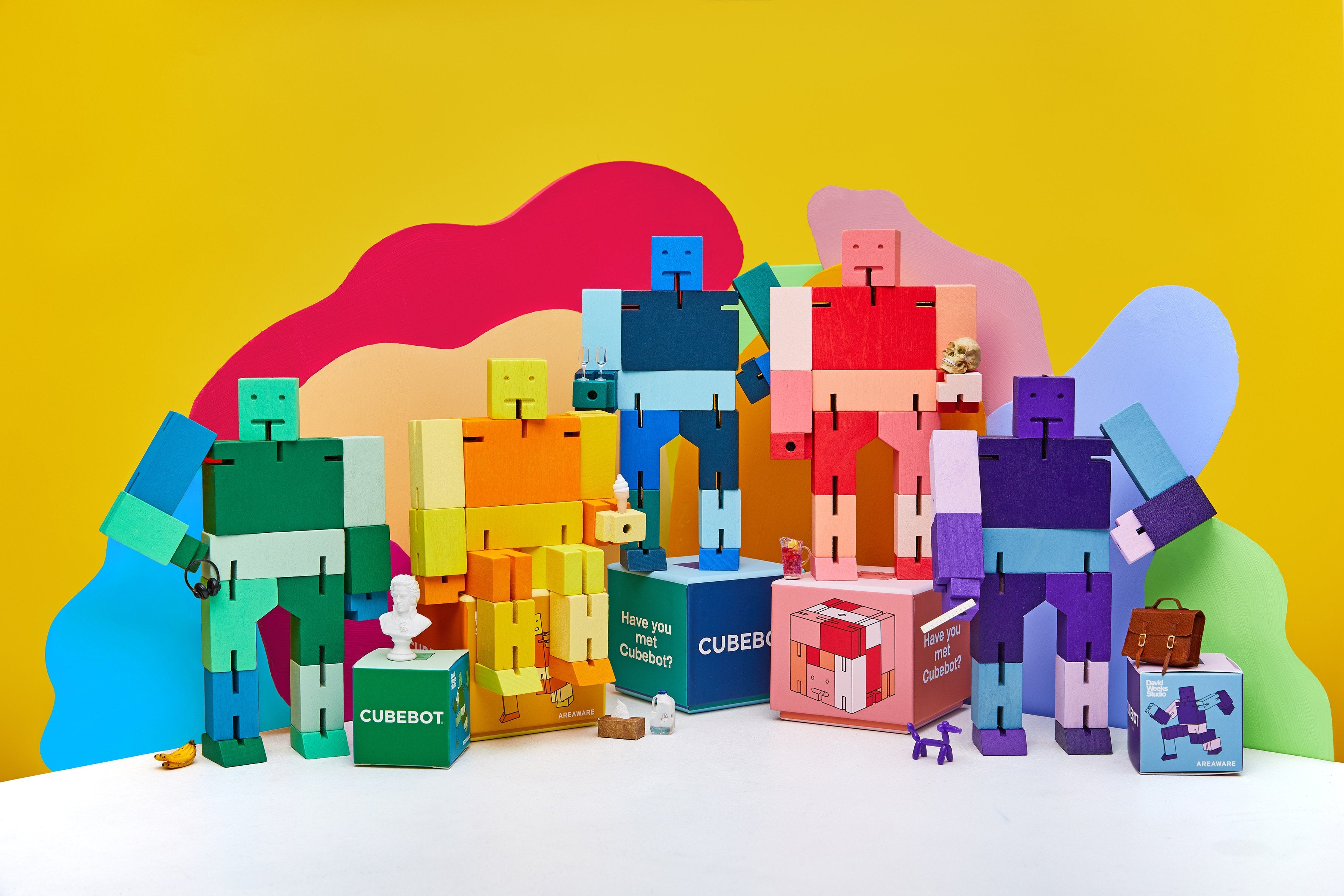 Collection of Areaware Cubebots in a mix of bright colors