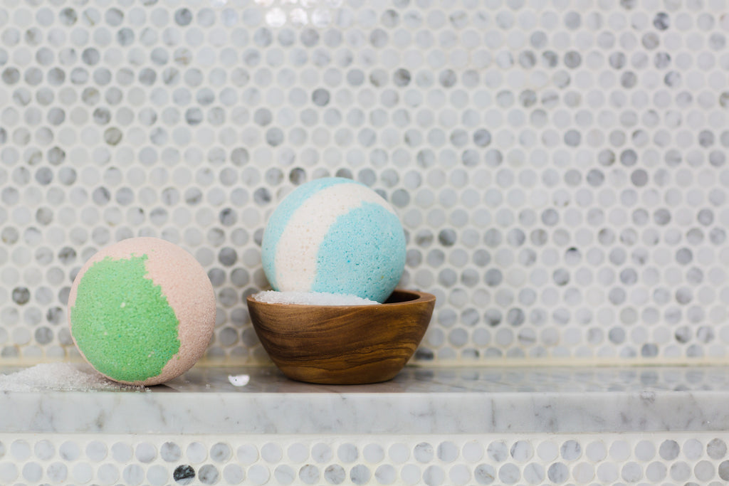 Bath bombs sitting in a shower