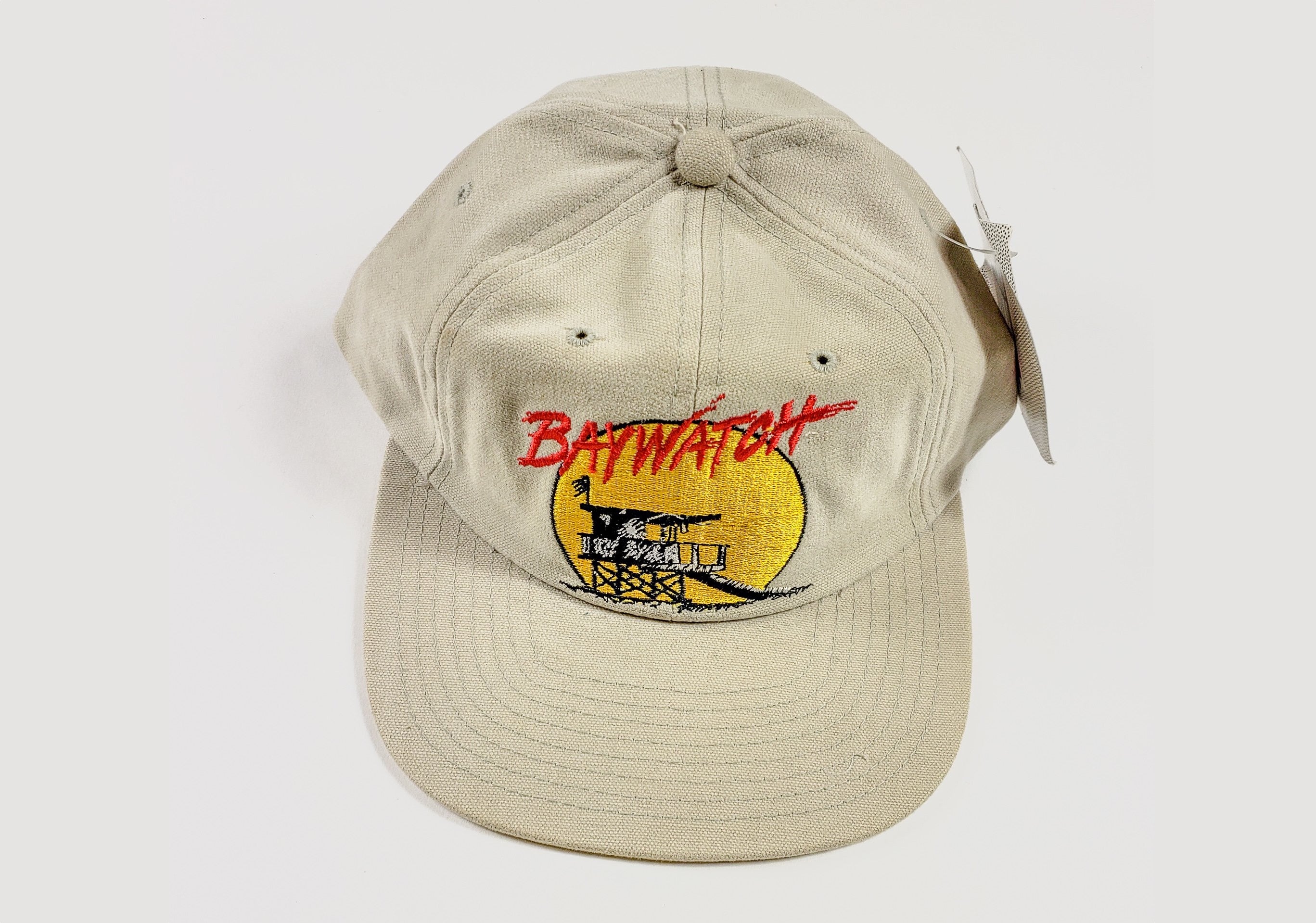 Vintage snapback cream hat with "Baywatch" design