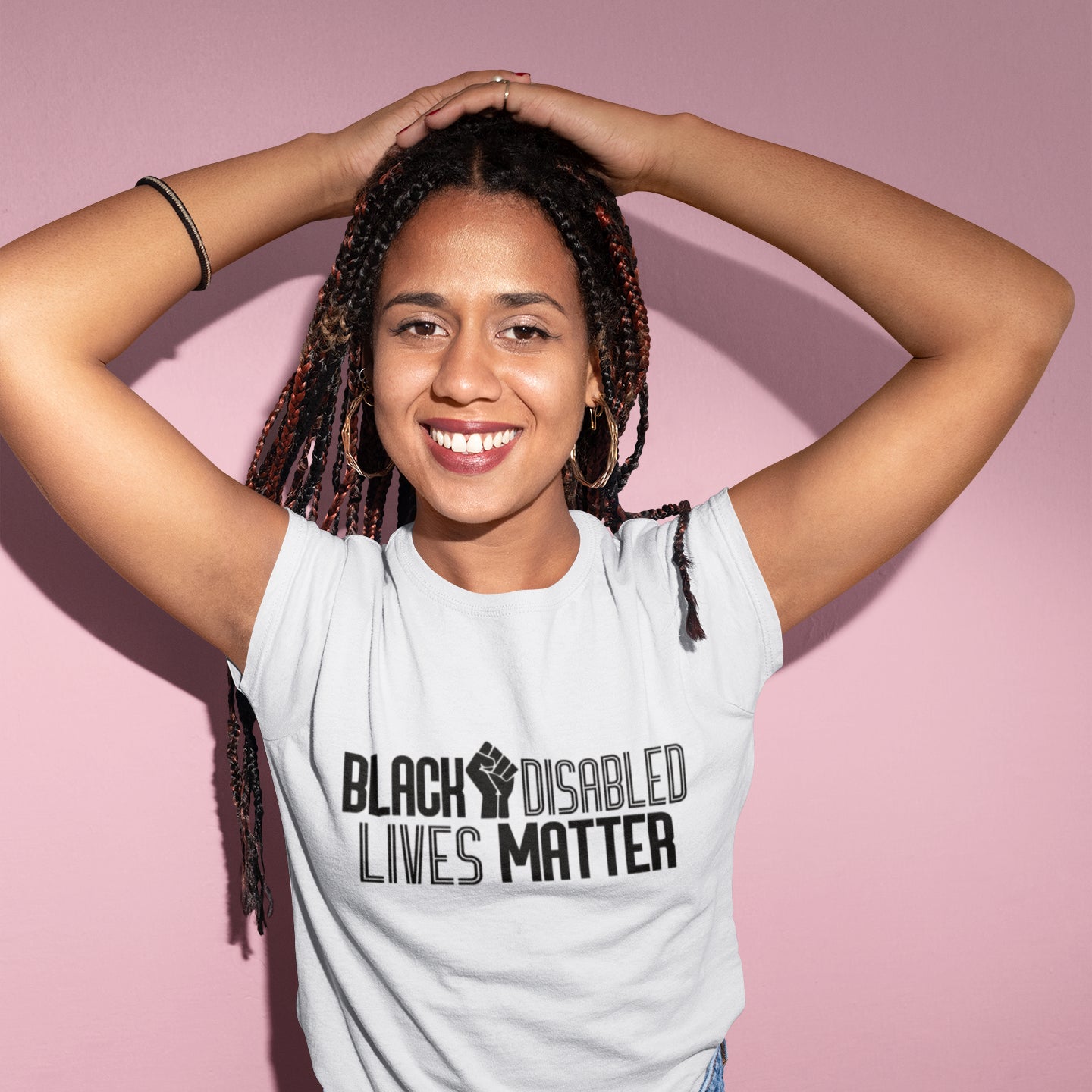 Model wears a t-shirt that reads "Black disabled lives matter"