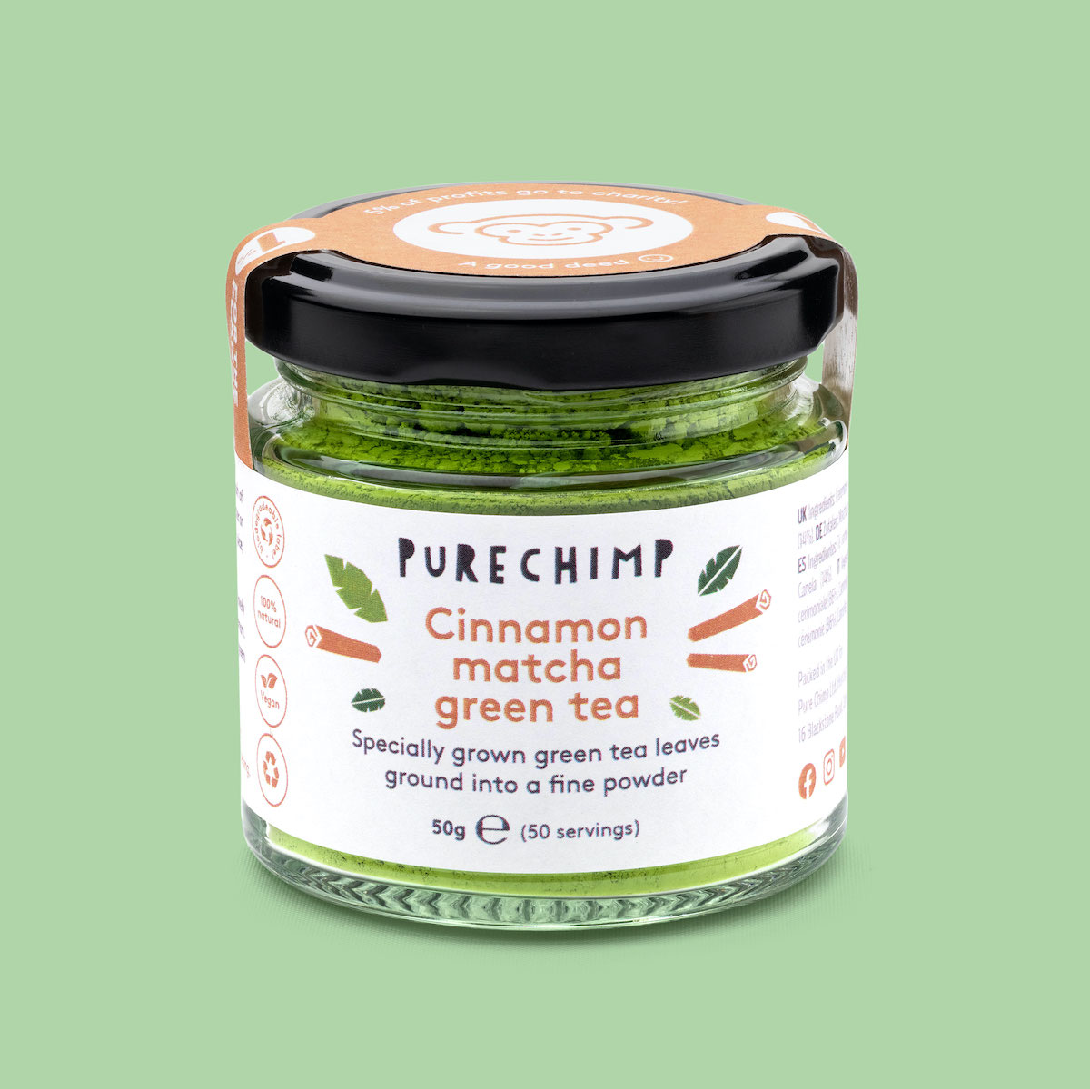 A jar of cinnamon flavoured matcha by PureChimp against a green background.