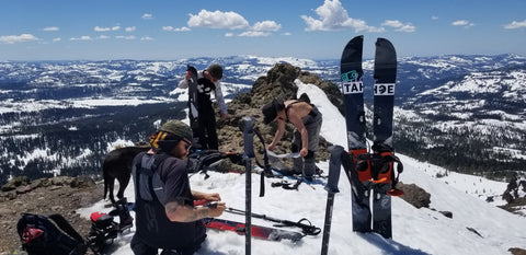 Taking the Skins of our Splitboards in preparation for the ride down of Castle Peak