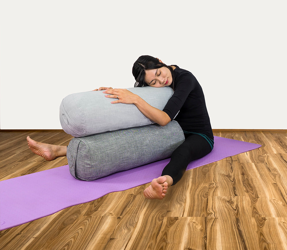 Explore FLEXIBILITY in Upavista Konasana  Place bolster (or two, or three!)  just ahead of you as a soft landing pad for either for the hands or head. 
