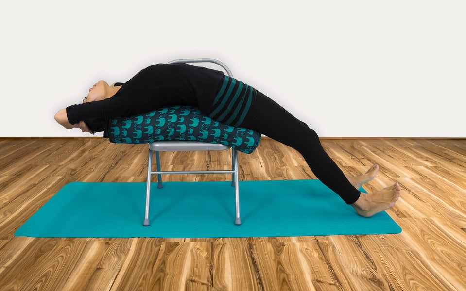 Backbend Pose with Yoga Bolster using a Yoga Chair