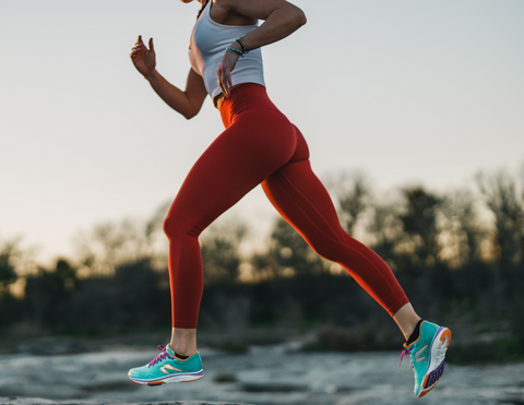 Woman running in Newton shoes