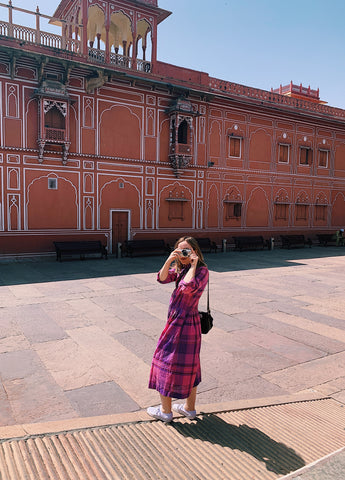 lily parkinson taking a photo at jaipur city palace