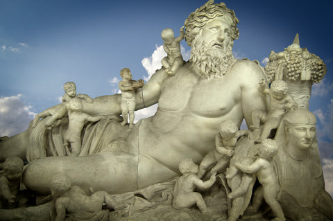 statue of god Zeus surrounded by his children