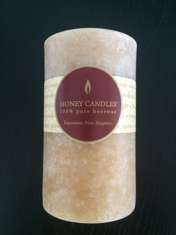Bloom on a beeswax candle